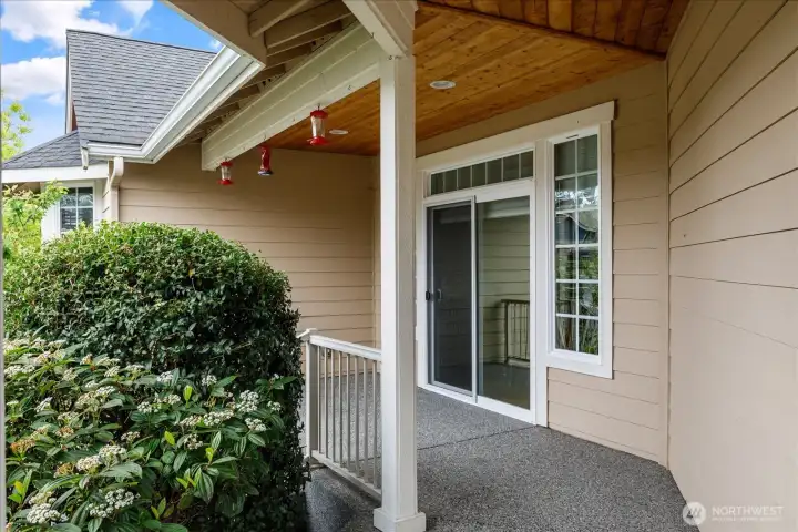 Sliding Glass door from the Dining Room out to a small covered patio.