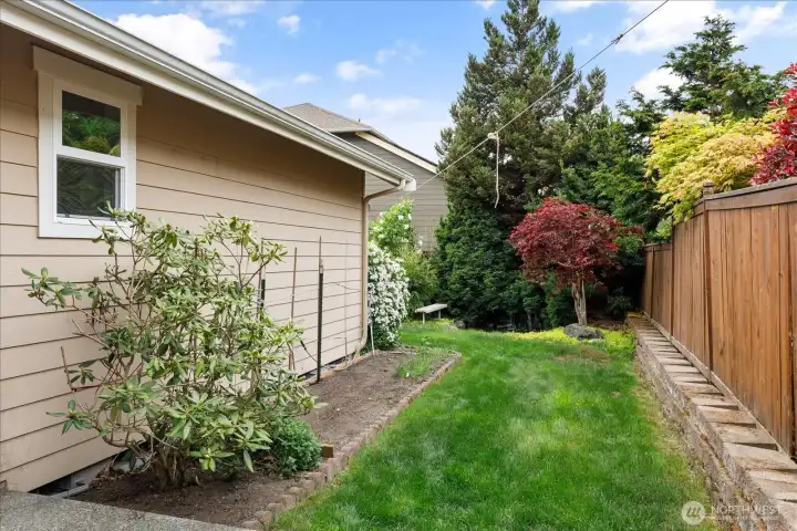 The backyard is fully-fenced and has outdoor sprinkers.