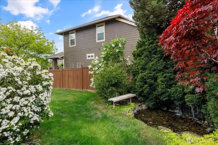 The backyard features a wonderful pond & fountain, and makes for a very relaxing place to hear the running water.
