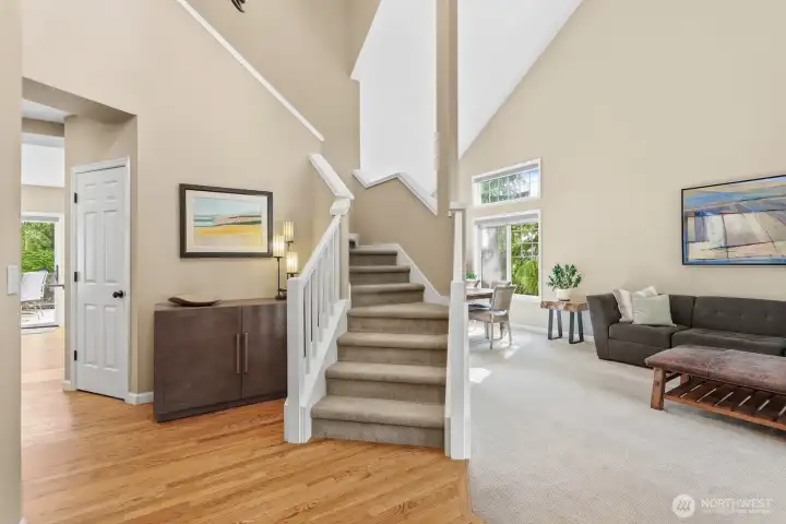 From the charming covered front porch, you enter the foyer greeted by soaring ceilings, warm paint tones, elegant living spaces and inviting everyday areas.