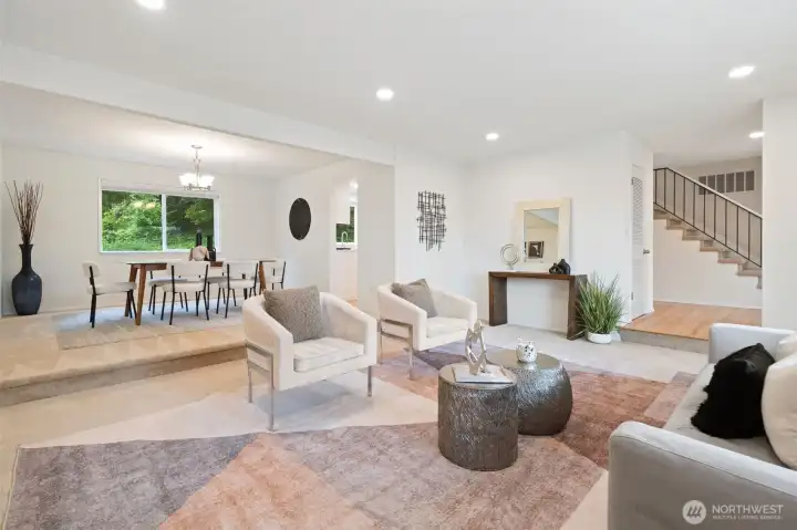 Generous living room with large windows to the mountains - new canned lighting, fresh paint & carpets - Open to Dining Room for ease in entertainment