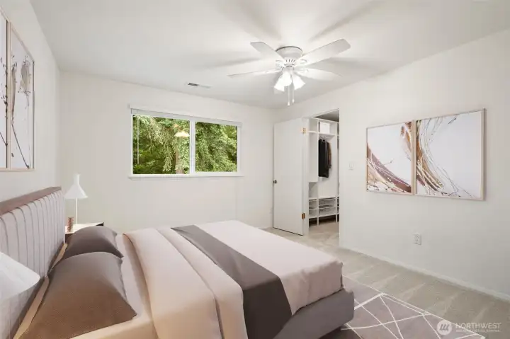 2nd level bedroom with fan and views of evergreen trees - fresh carpets & paint. Virtually staged to show size & possibilities. Larger walk in closet.