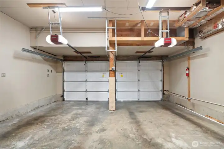 Generous garage - to the left are stairs that lead to a large attic storage space also.