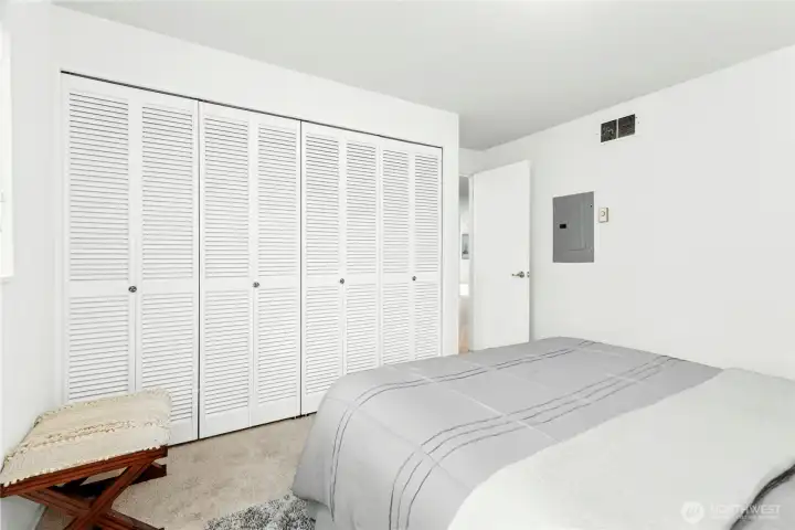 with a closet wall for storage
