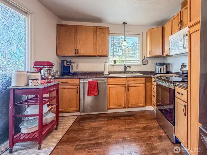 Lots of Cabinets for Storage, New Stove and updated appliances, Wood Laminate Flooring