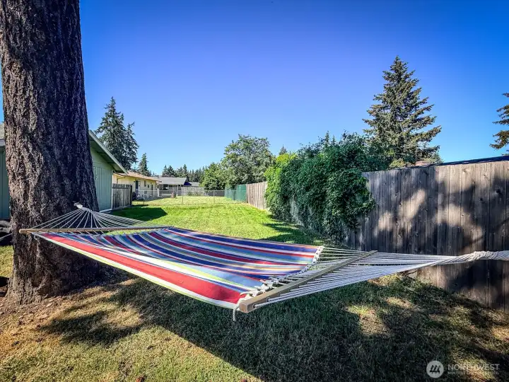 Relax in fully fenced yard while the dogs or kids play