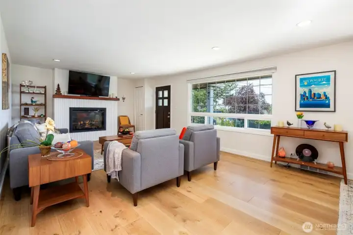 Living room, cozy fireplace & some great Views!