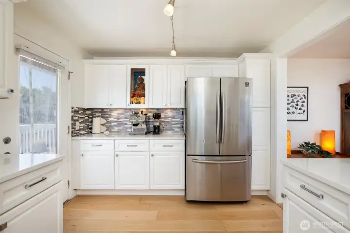 This home has a great coffee bar area. Plenty of storage. This kitchen was completely kitchen remodel & upgrade in 2021