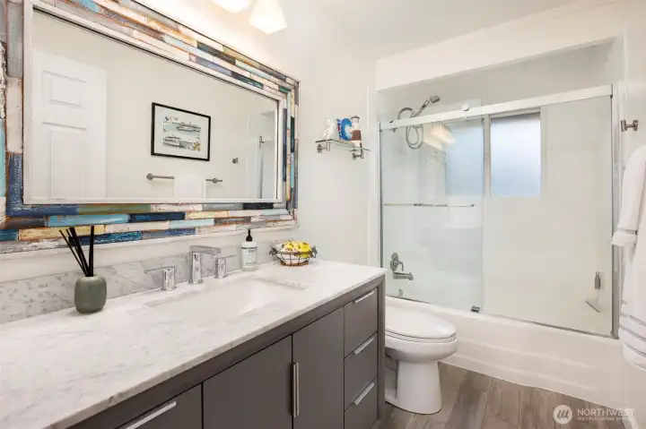 Full bath next to primary bedroom could also be incorporated into  the bedroom if you prefer ensuite