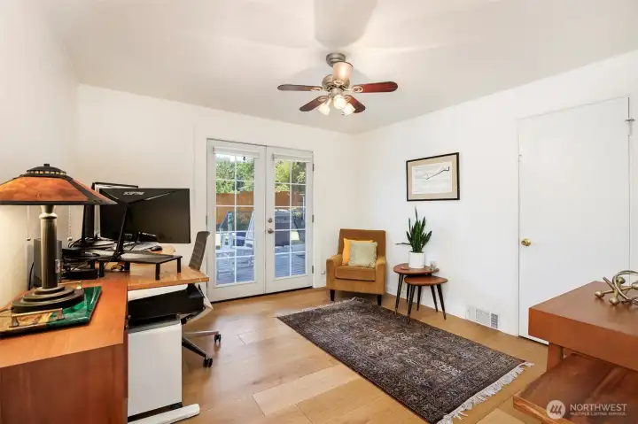 2nd bedroom on main floor is an office & leads to the private  deck flat backyard & private garden area