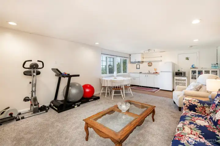 Another view of the main living room  area lower level, light & bright with a large picture window