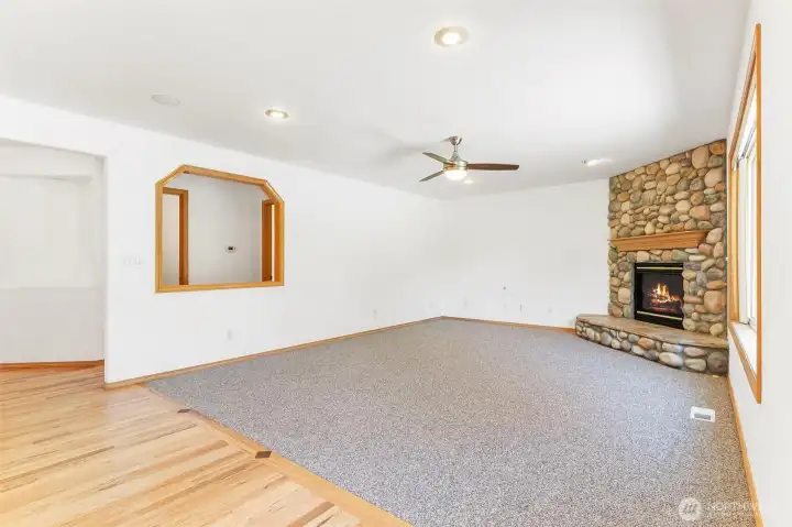 Welcome home! This spacious living area features cozy finishes and large windows that flood the room with natural light. Welcome home! This spacious living area features cozy finishes and large windows that flood the room with natural light.