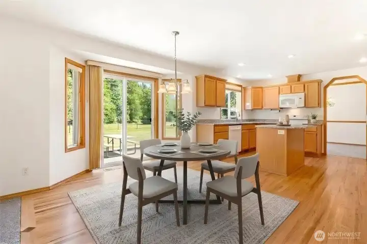 Kitchen with eating space in addition to formal dining. (Virtually staged) Kitchen with eating space in addition to formal dining. (Virtually staged)