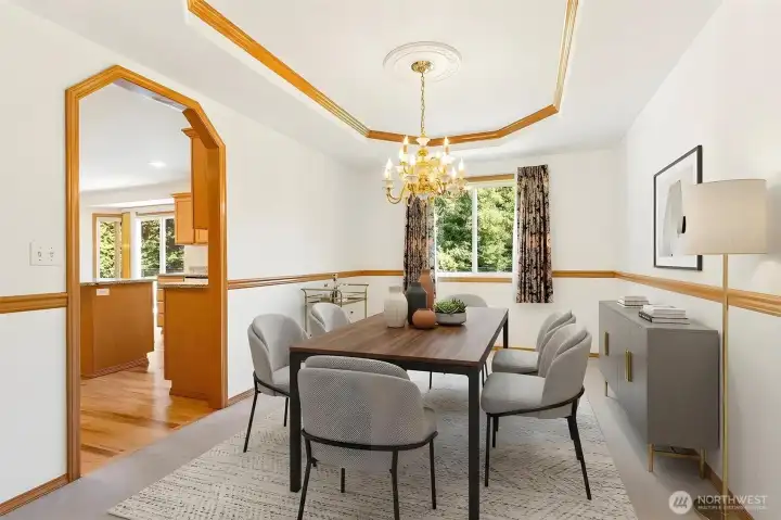 Formal dining room with chandelier—ideal for hosting holiday dinners. (Virtually staged) Formal dining room with chandelier—ideal for hosting holiday dinners. (Virtually staged)