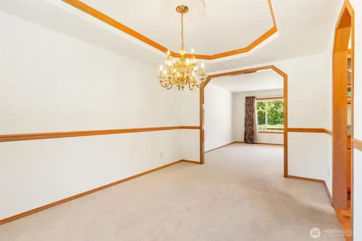 Formal dining to front living room. Formal dining to front living room.