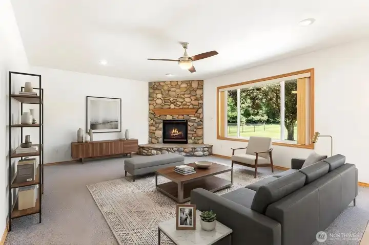 Relax in the expansive family room, perfectly positioned for movie nights or quiet evenings. (Virtually staged) Relax in the expansive family room, perfectly positioned for movie nights or quiet evenings. (Virtually staged)
