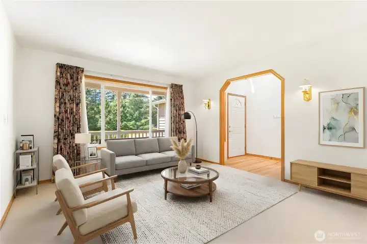 Formal living room with a classic archway—perfect for greeting guests or a quiet reading nook. (Virtually staged) Formal living room with a classic archway—perfect for greeting guests or a quiet reading nook. (Virtually staged)