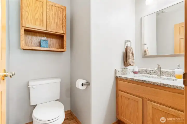 Tastefully updated 1\2 bathroom with modern fixtures and a clean, crisp feel. Tastefully updated 1\2 bathroom with modern fixtures and a clean, crisp feel.