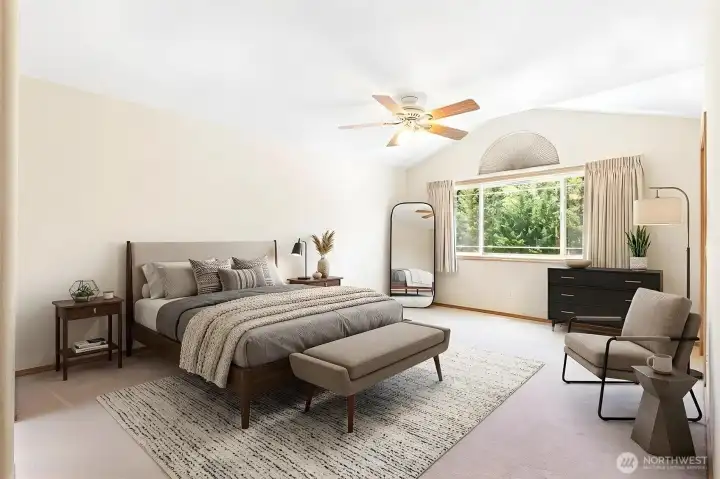 The expansive primary suite offers a peaceful retreat with ample room for a king-sized bed. (Virtually staged) The expansive primary suite offers a peaceful retreat with ample room for a king-sized bed. (Virtually staged)