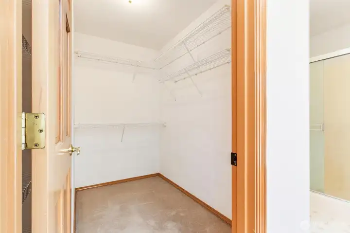 Huge walk-in closet with built-in organization to keep everything in its place. Huge walk-in closet with built-in organization to keep everything in its place.