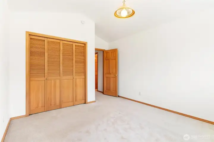 Generous secondary bedroom with large closets and plenty of natural light. Generous secondary bedroom with large closets and plenty of natural light.