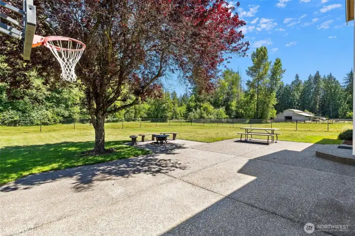 Fully fenced back yard and fun fire pit for the long summer nights Fully fenced back yard and fun fire pit for the long summer nights