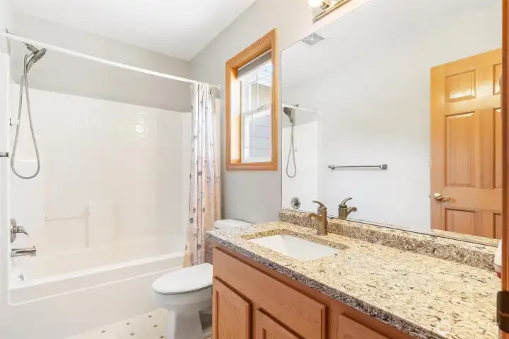 Secondary bathroom with plenty of storage. Secondary bathroom with plenty of storage.