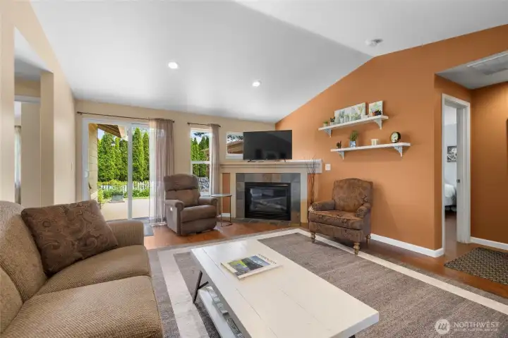 Living room with vaulted ceilings and gas fireplace