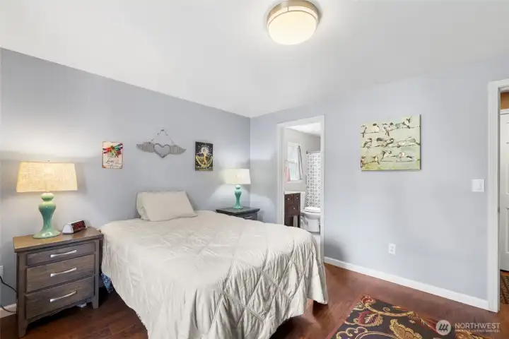 Primary bedroom with ensuite. Full bathroom and walk-in closet.
