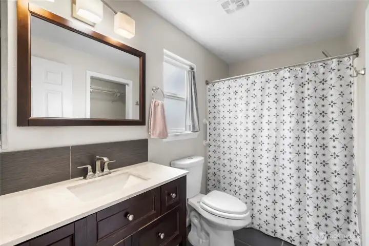 Nicely updated Primary suite bathroom.