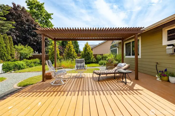 Love this sunny deck and pergola.