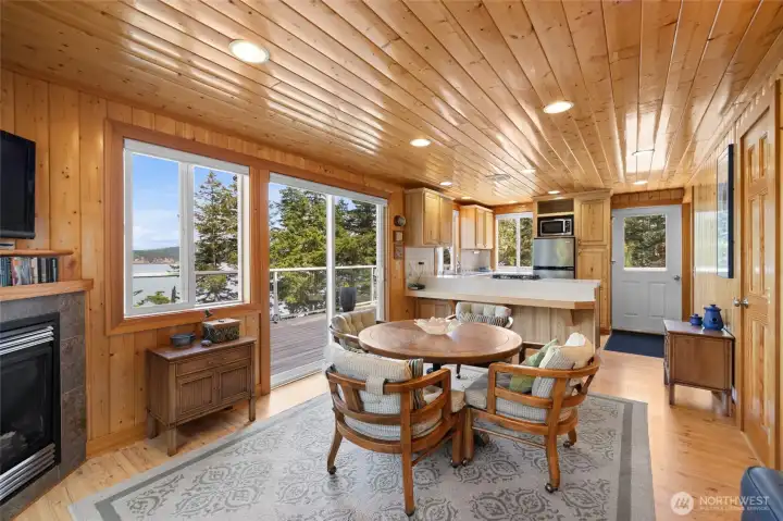 Warm wood interior throughout, propane fireplace and open floorplan