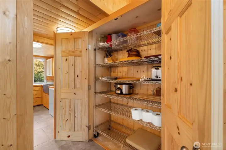 Large pantry for all your supplies. Tile floors throughout entry and laundry.