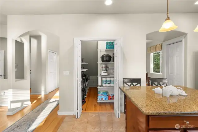 Enjoy ample pantry storage with built-in organizers, thoughtfully designed for maximum convenience and easy access to all your essentials.