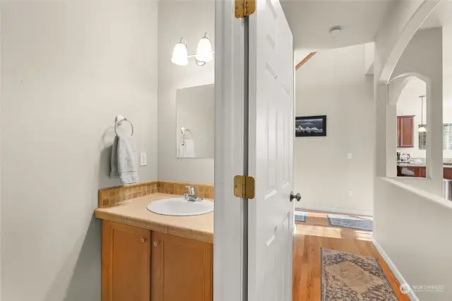 The perfect powder room is conveniently located on the main level and just the right size for all the guests you’ll be hosting. It’s designed for high usage and, thankfully, is so easy to clean that even your busiest days won’t leave you sweating over it!