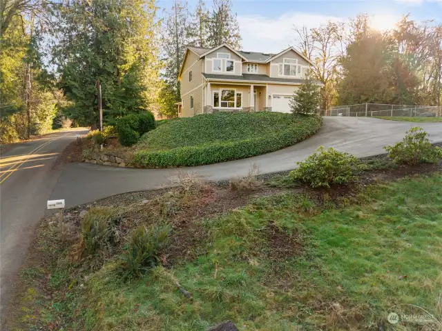 Fantastic paved driveway with off plenty of parking and a 2 car garage.