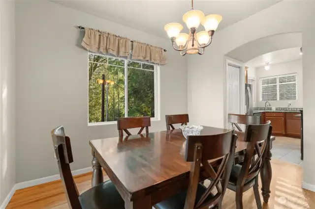 The spacious formal dining room, conveniently located right off the Chef's kitchen, is perfect for hosting memorable holiday gatherings with friends and family. Its inviting layout makes entertaining effortless and enjoyable.