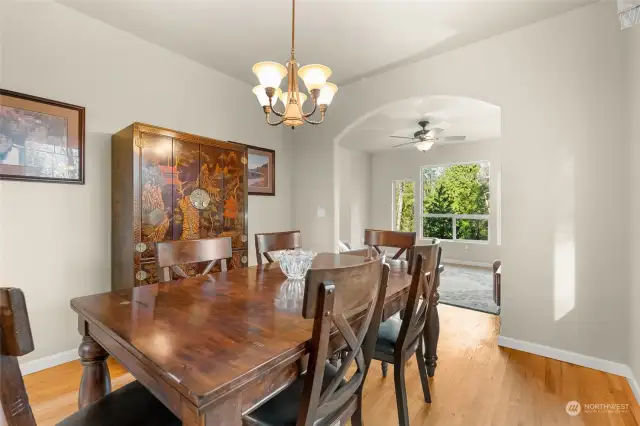 The arched transitions between rooms and the tasteful color palette on the walls add a touch of elegance, making this home truly turn-key and ready for its next owners.