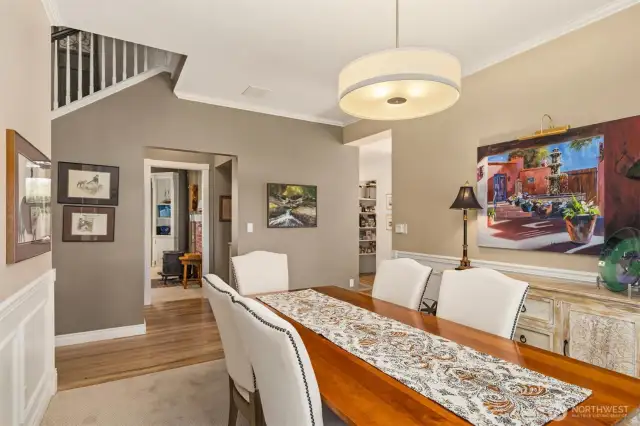 Back in the main area of the home, you'll find the private dining room, conveniently located just off the kitchen and the den/office.