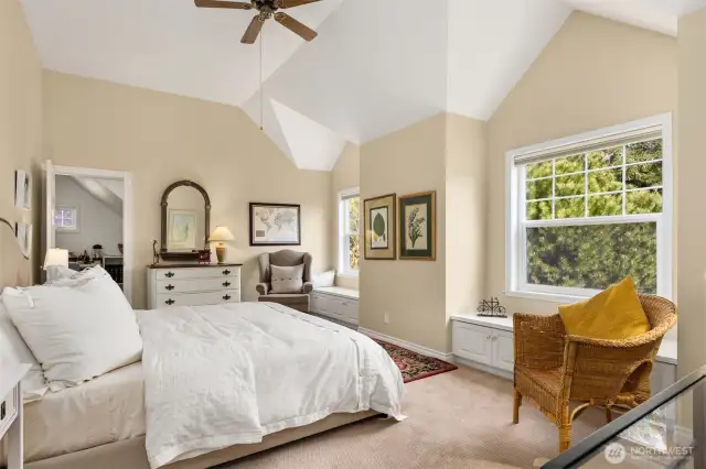 The fourth bedroom features two charming window seats and is generously sized—large enough to serve as a second primary bedroom upstairs. The spacious closet is currently being utilized as a bonus craft room, adding versatility to the space.