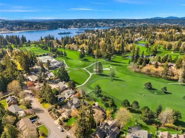 This wonderful Wing Point home with sweeping views of the golf course sits just a short stroll to downtown Winslow, the Seattle ferry, parks, schools and shopping!