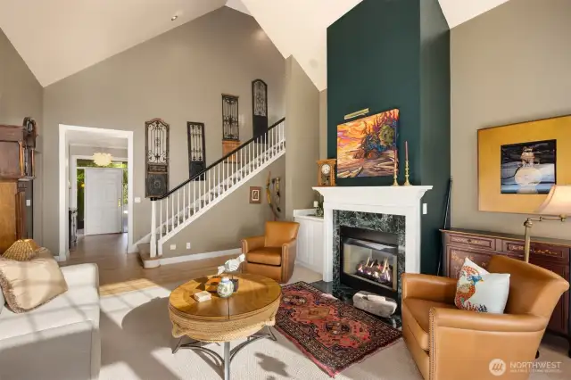 The beautiful living room is centrally located between the den/office, dining room, and the main floor primary suite. Upstairs, you'll discover three additional bedrooms, a spacious bonus craft area/bedroom closet and a full bathroom.