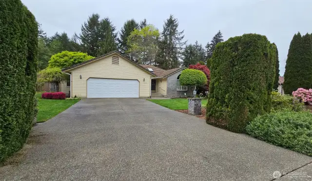 Two car garage (540 sq ft) and mature landscaping