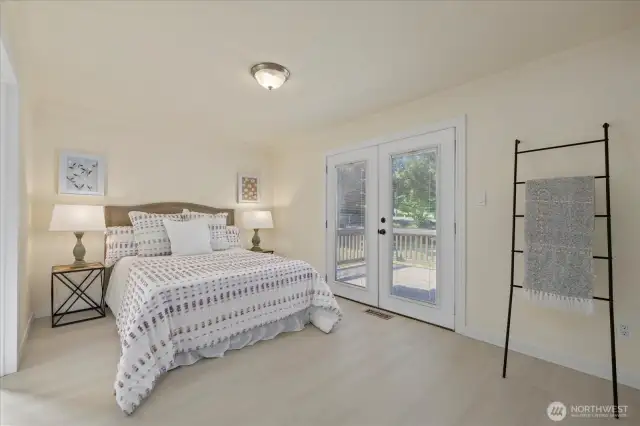 Primary bath with double door to front deck