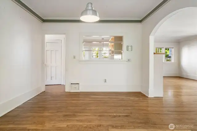 Dining room looking toward kitchen pass-through. Living room is to the right.