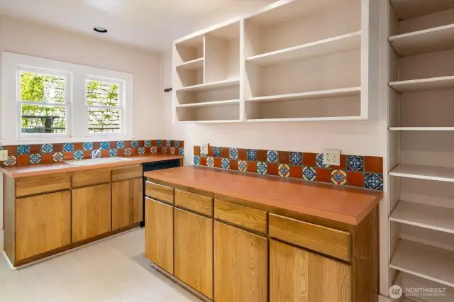 Kitchen with pass-through to the dining room.