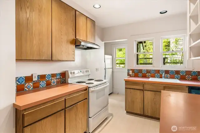 There's a door from the kitchen to the north side of the house.