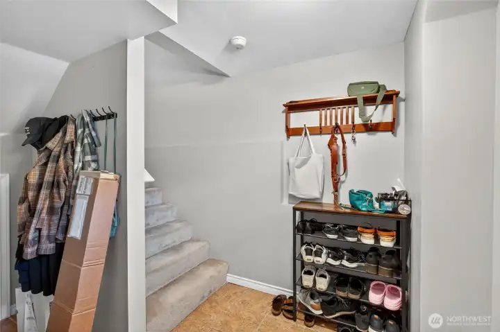 Stairs from front entrance, Garage on the left