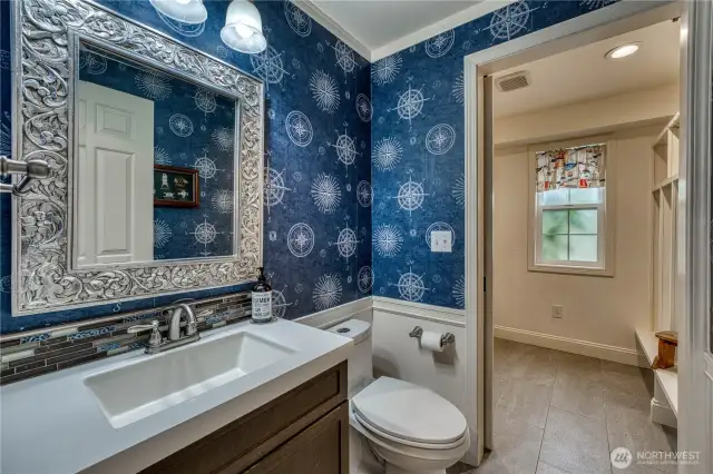 Main floor half bath/laundry - separated by a pocket door.