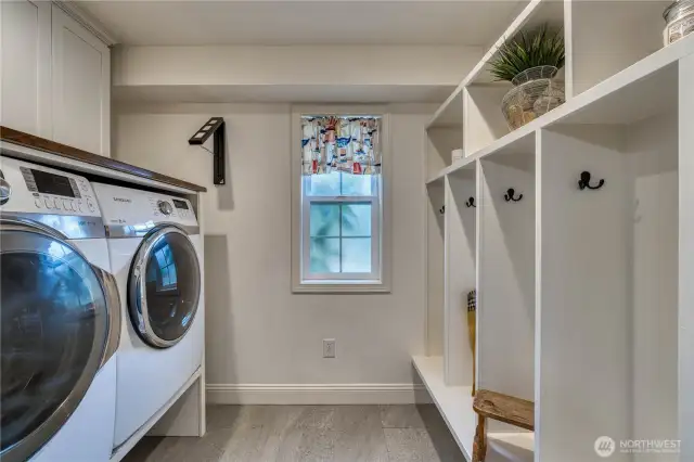Main floor half bath/laundry - separated by a pocket door.